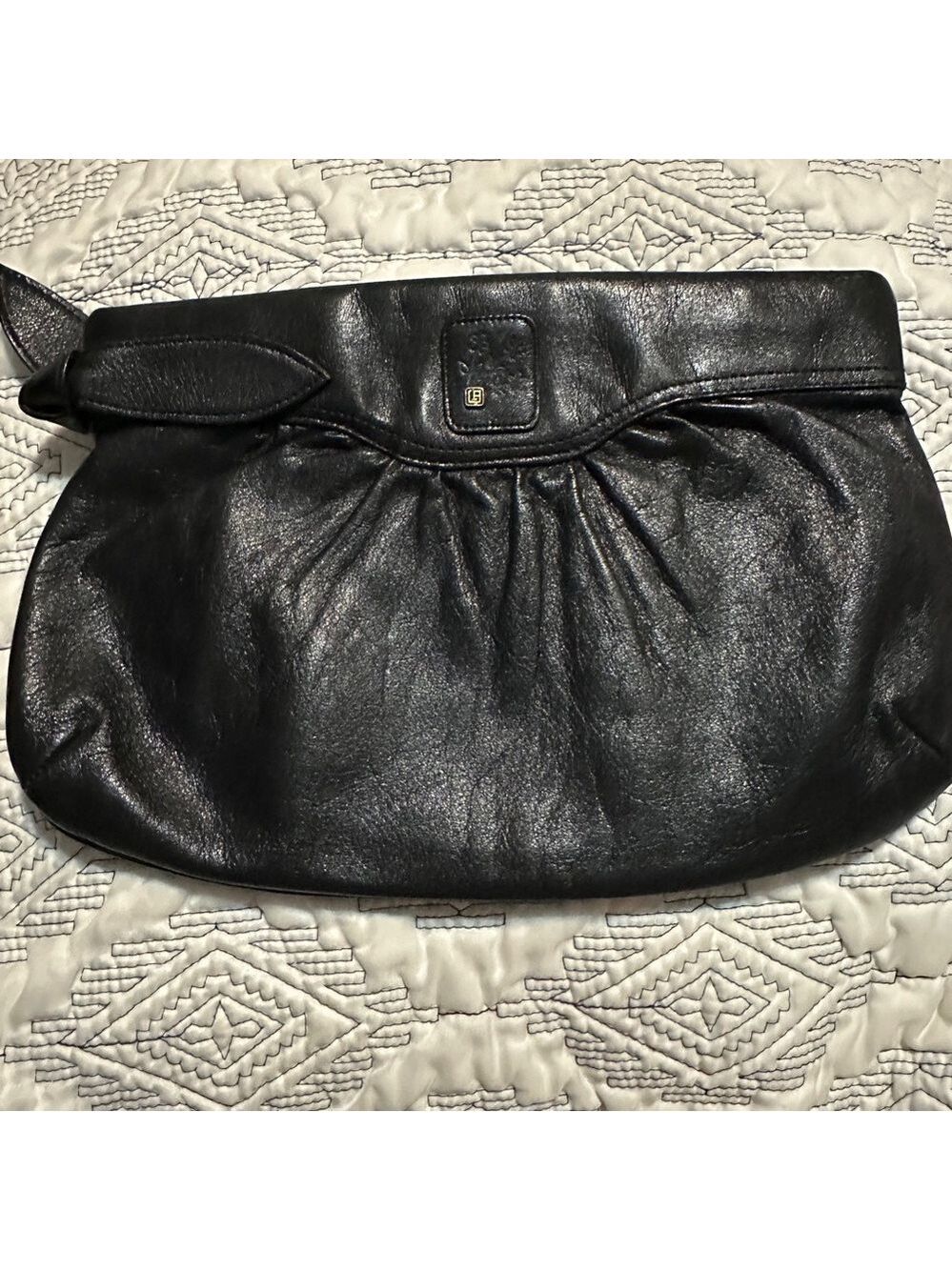 Elegant Black Leather Clutch with Pleated Design